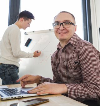 portrait-disabled-man-working-office