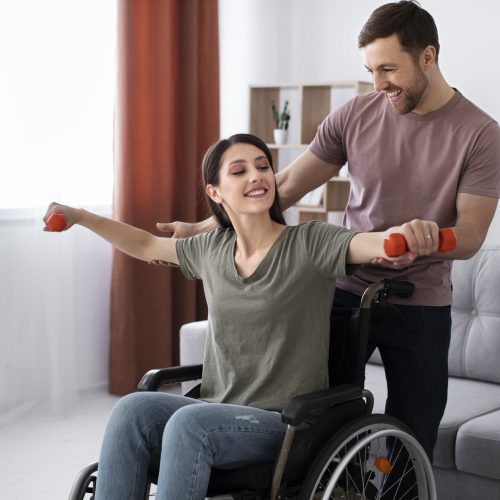 young-adult-helping-disabled-friend